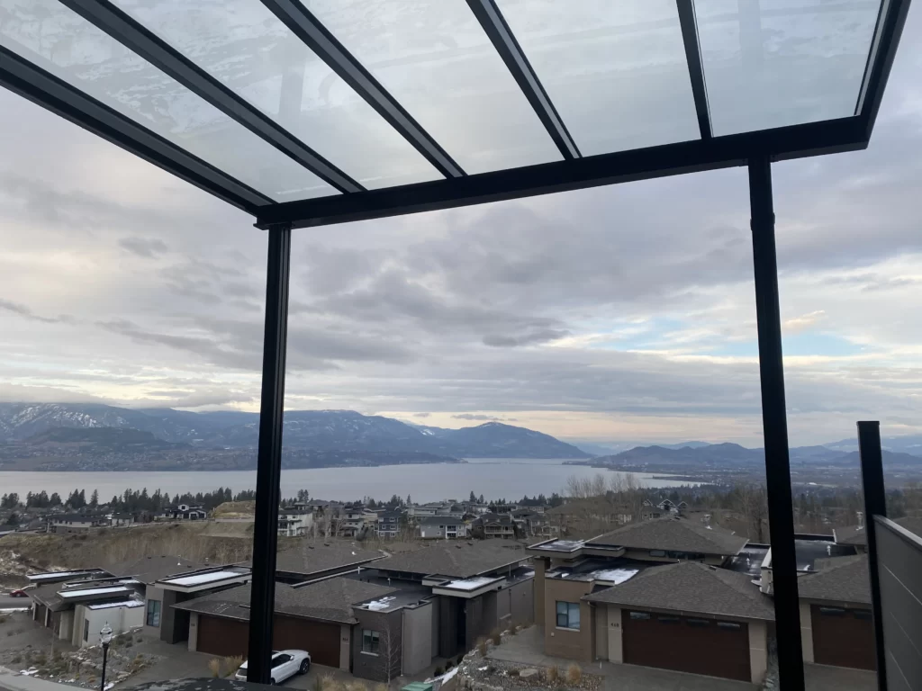 Glass patio cover with Okanagan Lake view in Kelowna