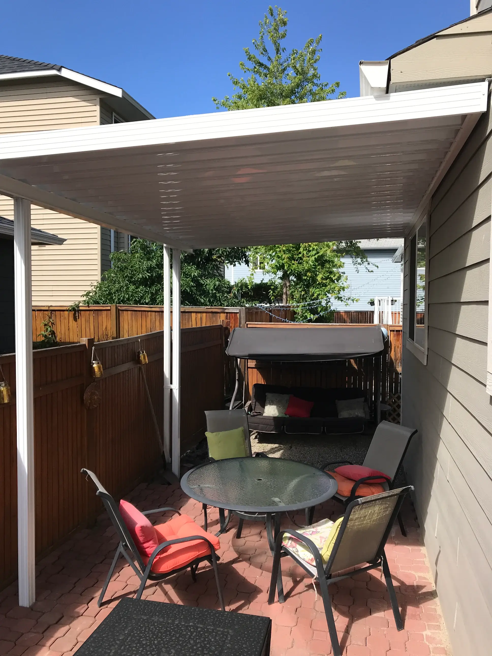 Professional aluminum patio cover installation in progress