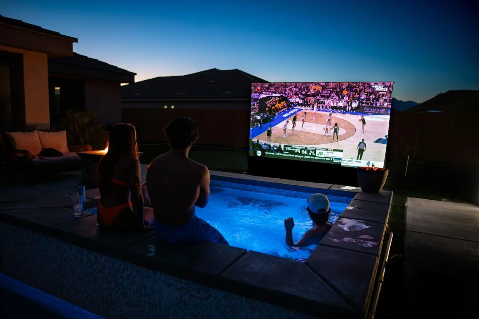 Outdoor entertainment area under a sun deck cover in Kelowna