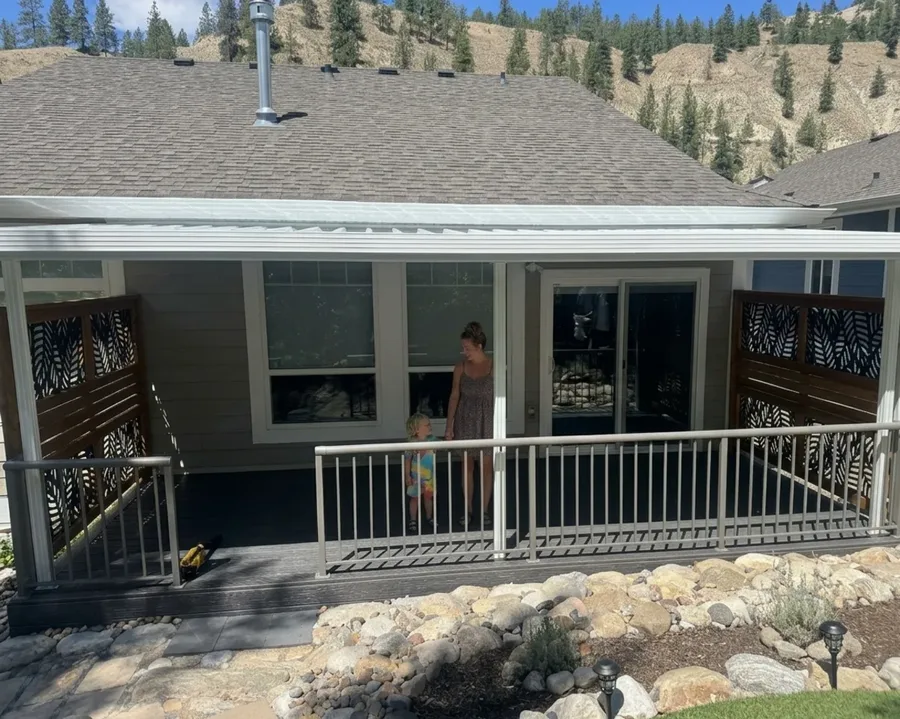Hillside deck after aluminum patio cover installation Kelowna