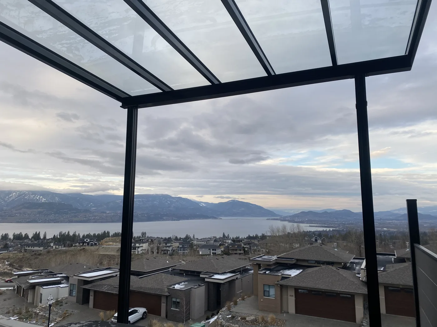 Glass roof patio cover with an Okanagan lake view, Kelowna