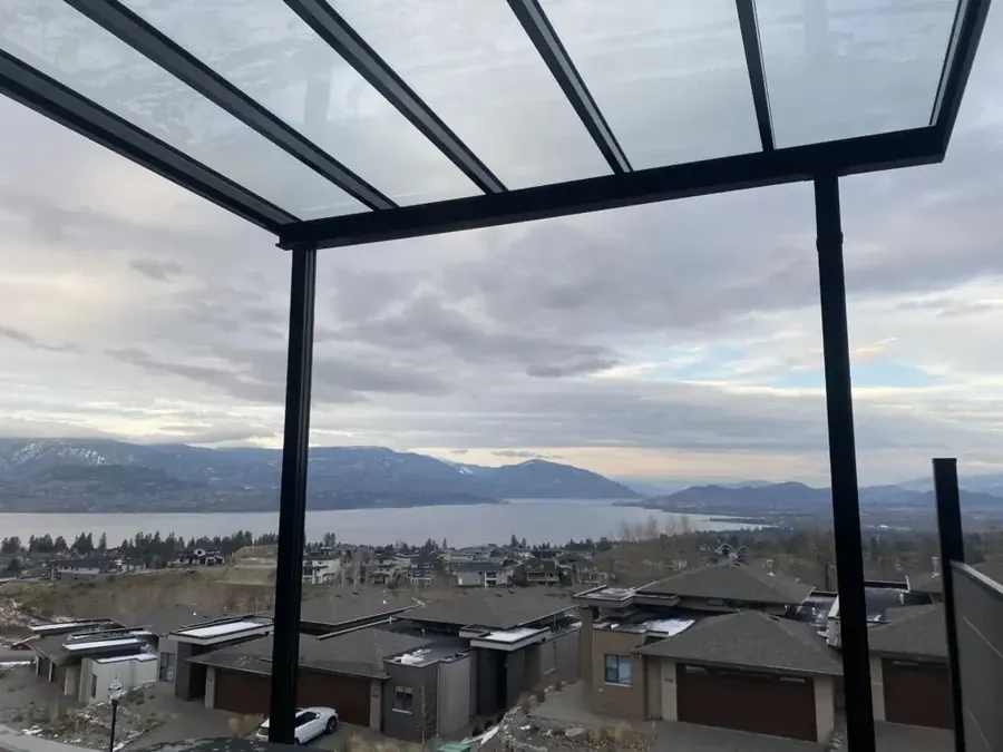 Glass patio cover with Okanagan Lake view in Kelowna